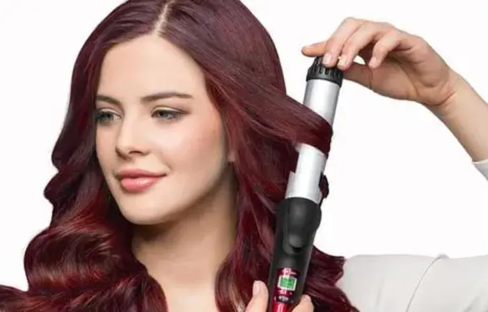 Is the curling iron used while heating?