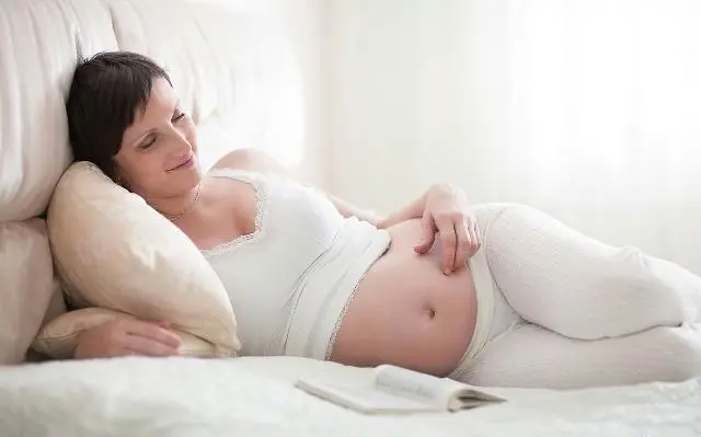 Sleeping position during pregnancy first three months 