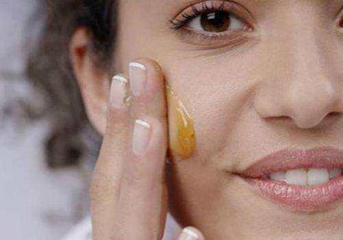 Should vitamin E be taken orally or applied to the face