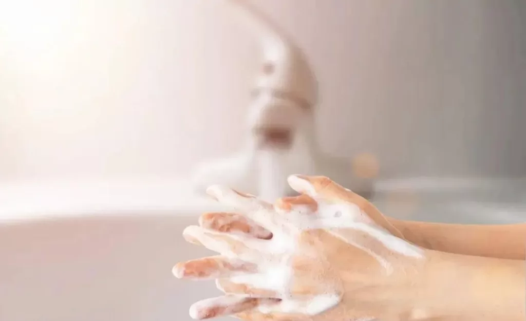Why do you have to dry your hands after washing your hands?