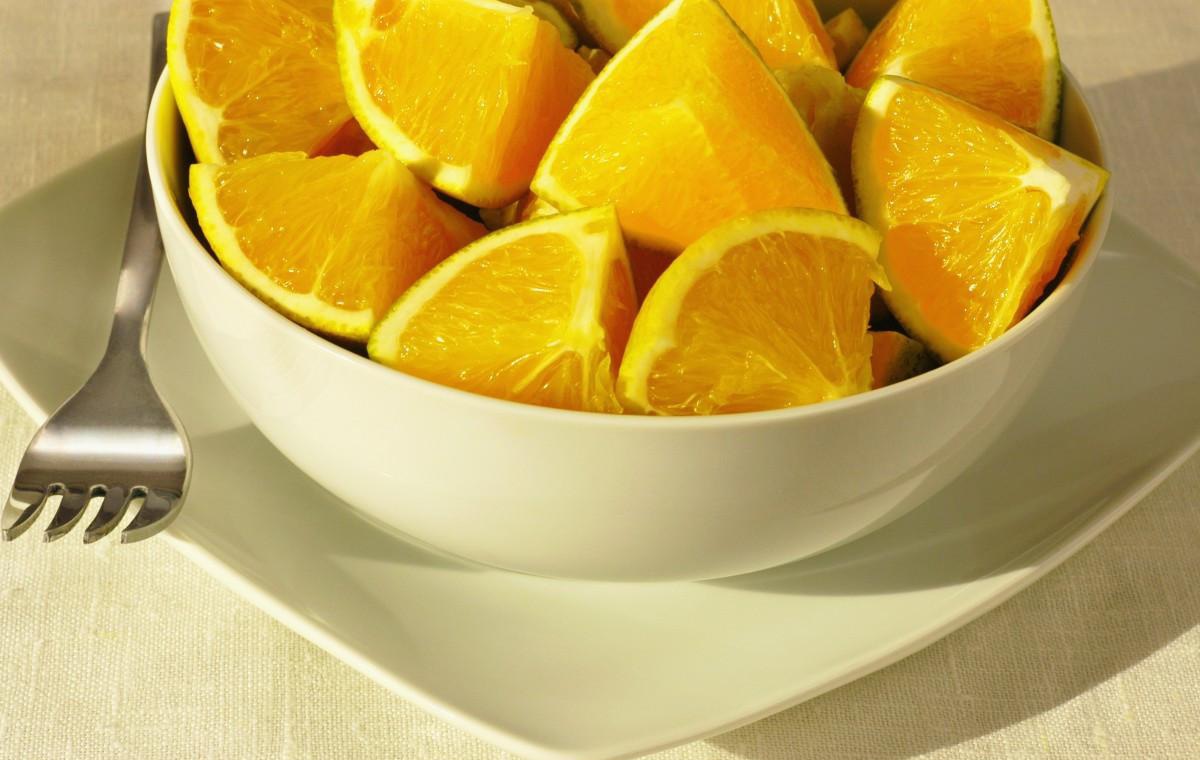 What are the benefits of oranges in the morning, Afternoon, and At
